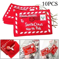 Sobres rojos bordados – Tarjetas, dulces y decoración navideña