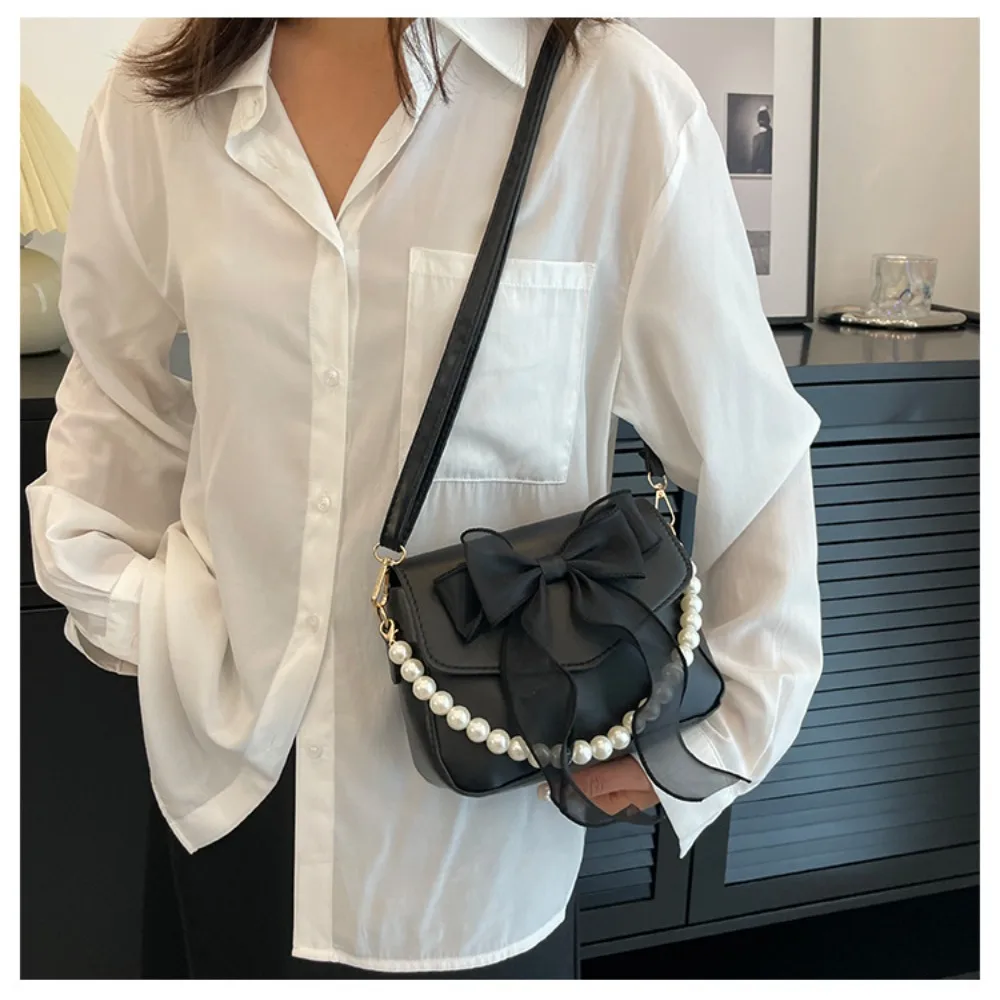 Bolsa de hombro bandolera de perlas PU con cadena y lazo - imagen 3