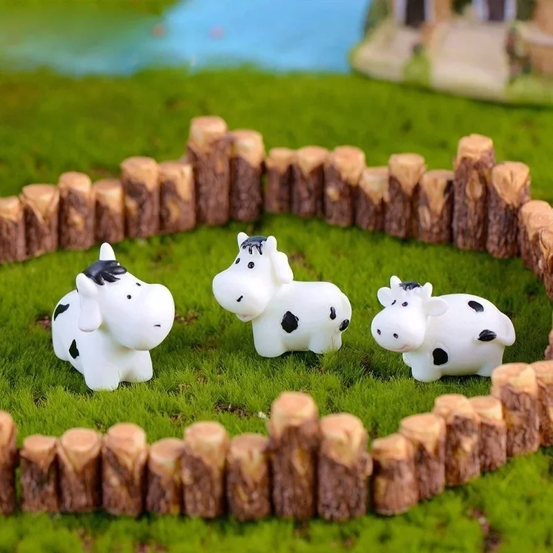 Detalle de la familia de vacas en miniatura