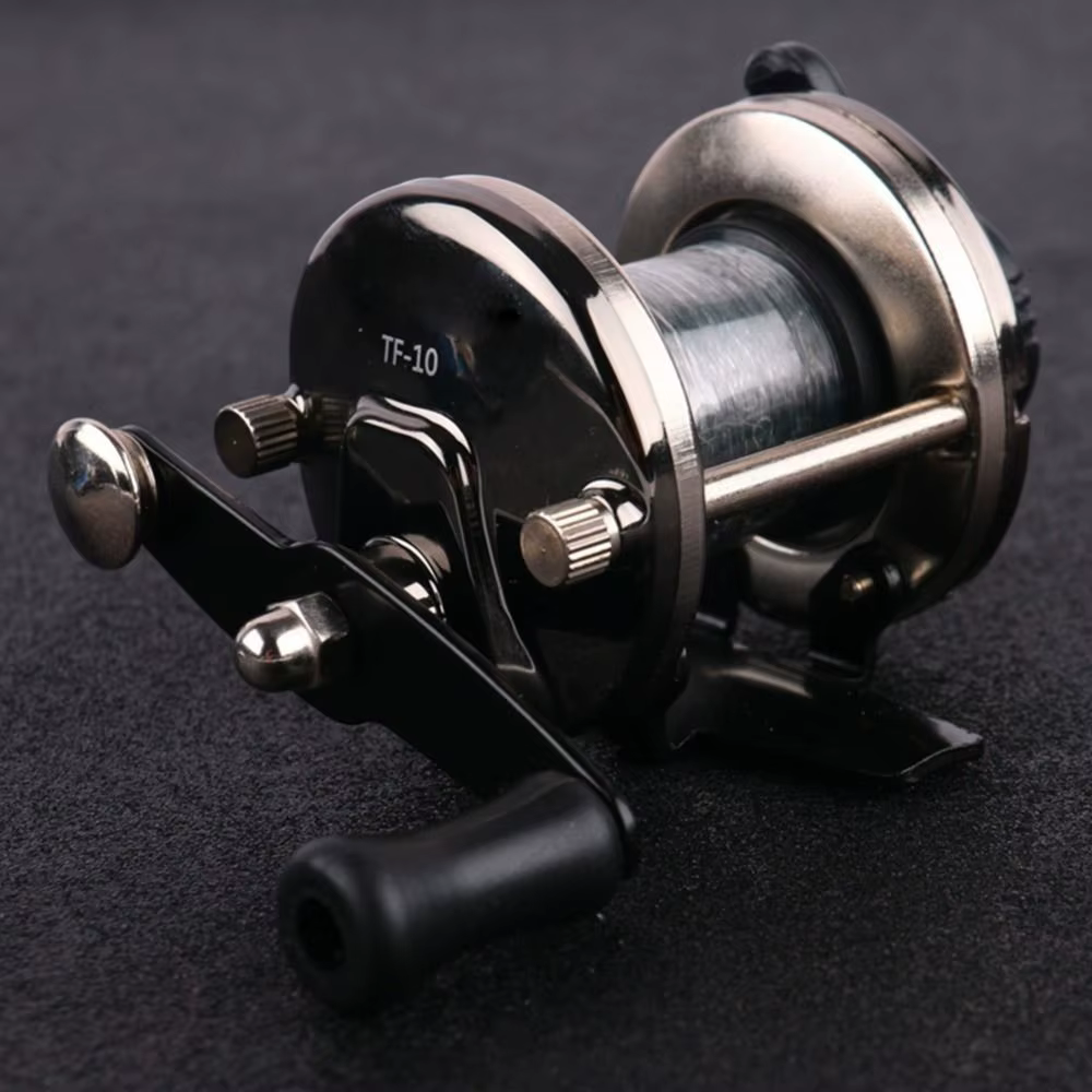 Carrete de pesca en hielo con línea y arrastre ligero de metal - imagen 5