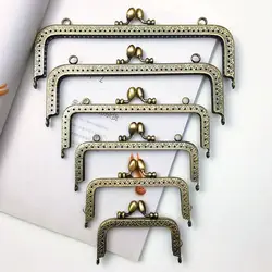 Mini marco metálico para bolso con cierre de beso y herrajes vintage