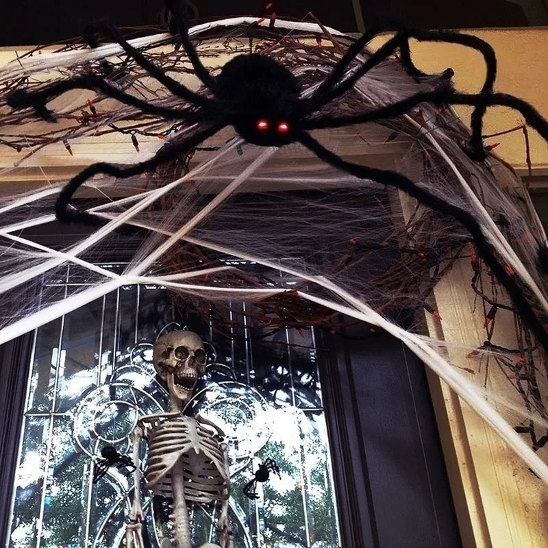 Araña de peluche gigante de Halloween negra, peluda y con ojos rojos