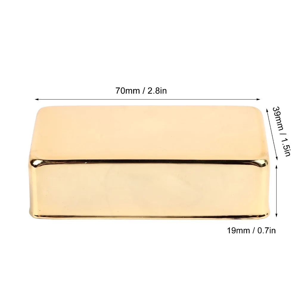 Cubierta Humbucker de latón con sellado negro y dorado, sin agujeros