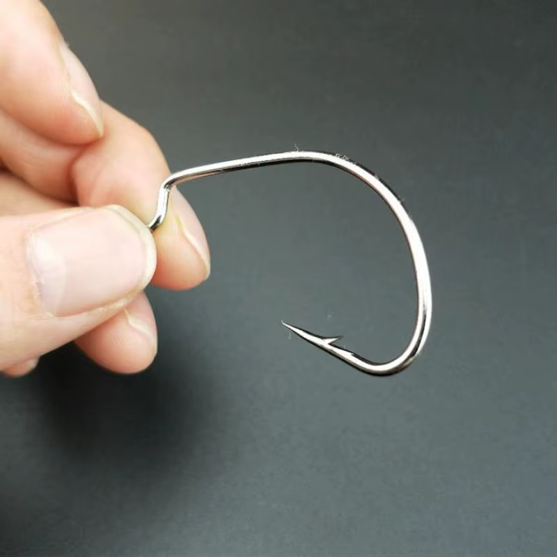 Anzuelo con tratamiento de punta y púa