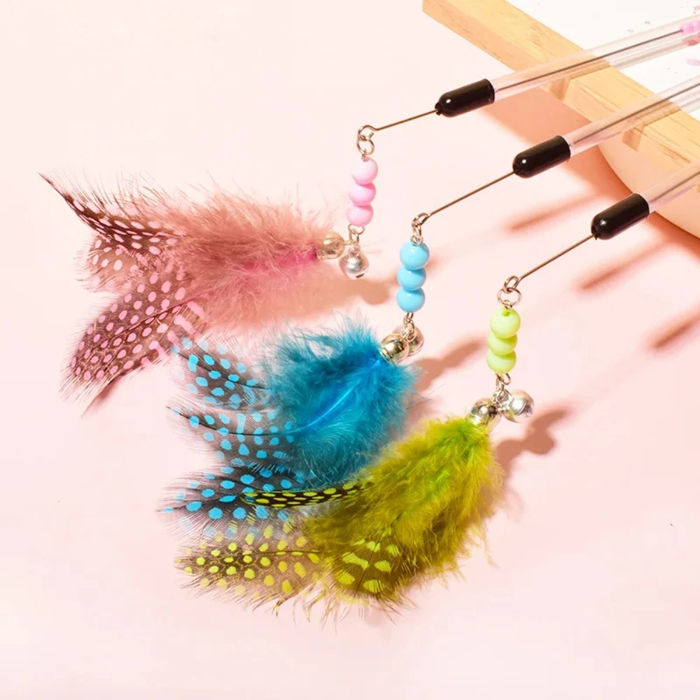 Juguete interactivo con plumas para gatos – palo retráctil - imagen 2