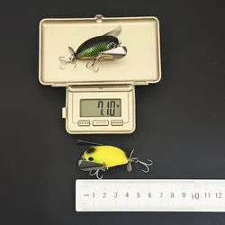 Señuelo Whopper Plopper de superficie con sonido y alas para lubina