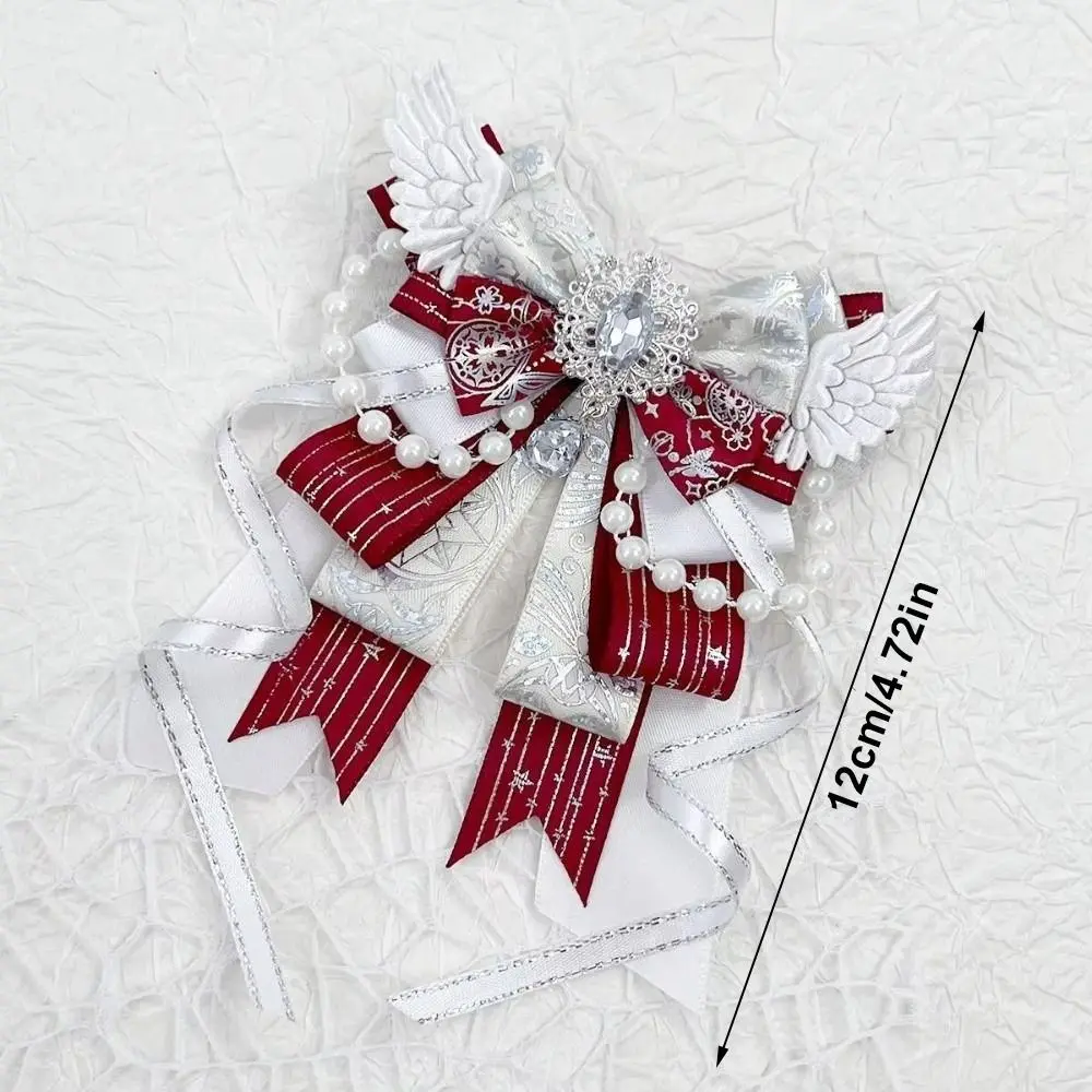 Accesorio lazo para itabag con cintas largas, cristales y perlas
