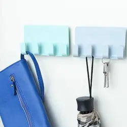 Soporte de pared sin costuras con ganchos y estante multifunción