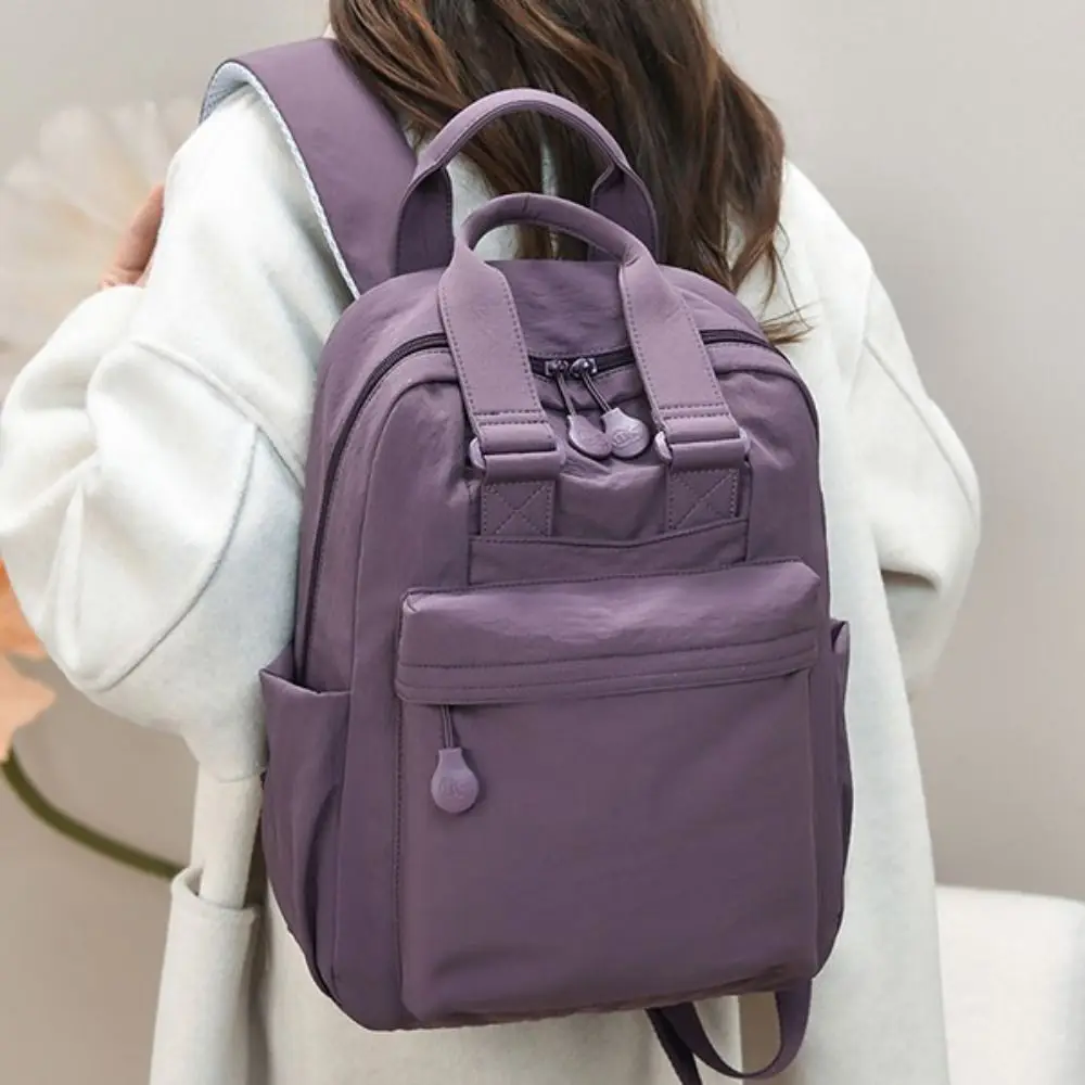 Mochila impermeable gran capacidad con compartimentos múltiples