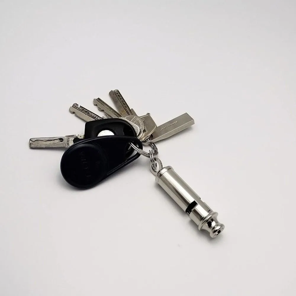 Silbato con cuerda para colgar o sujetar con seguridad
