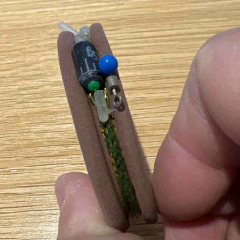 Línea de pesca camuflada anti-enredos con esmerillones - imagen 2