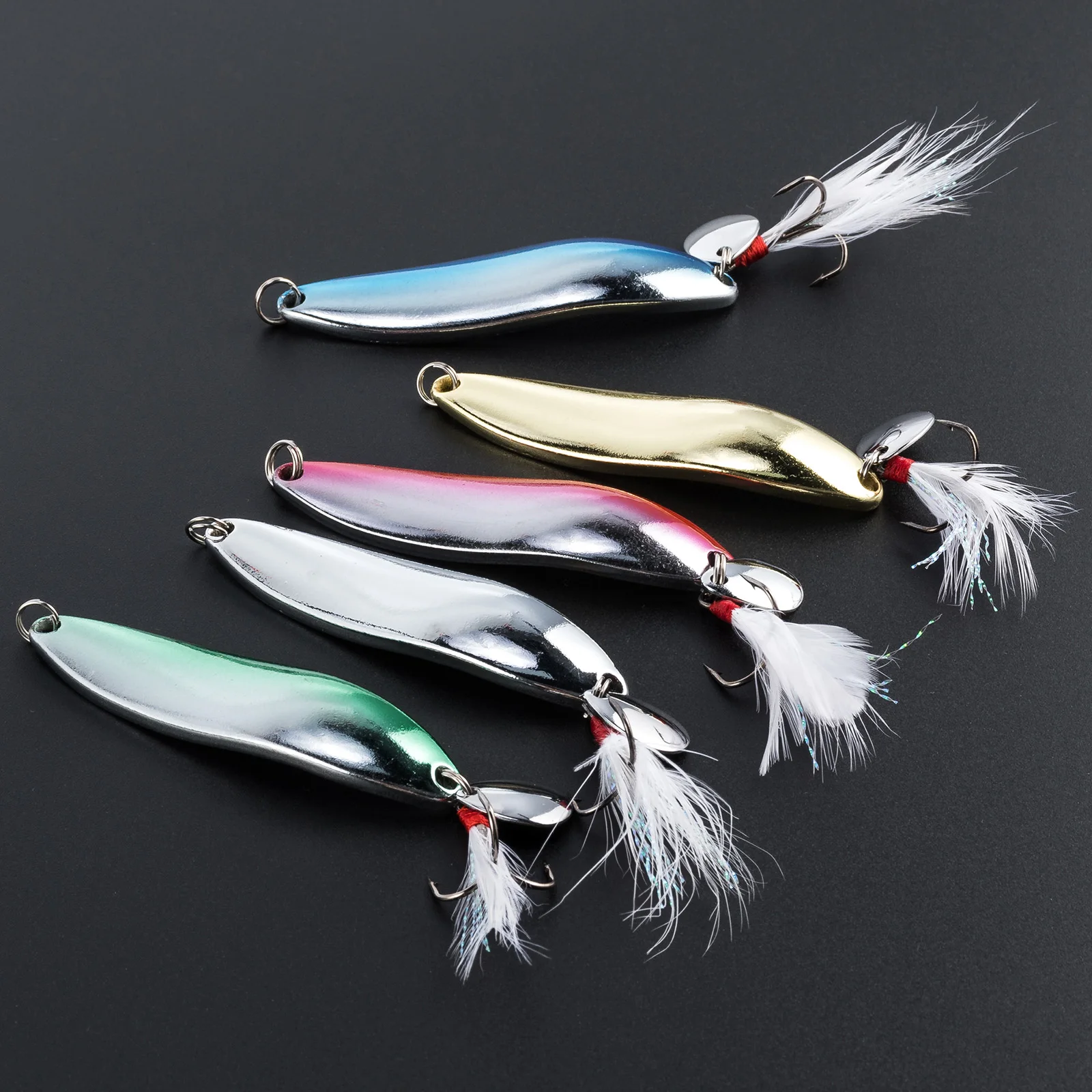 Señuelo metal con cola de cuchilla y plumas para lubina y trucha - imagen 4
