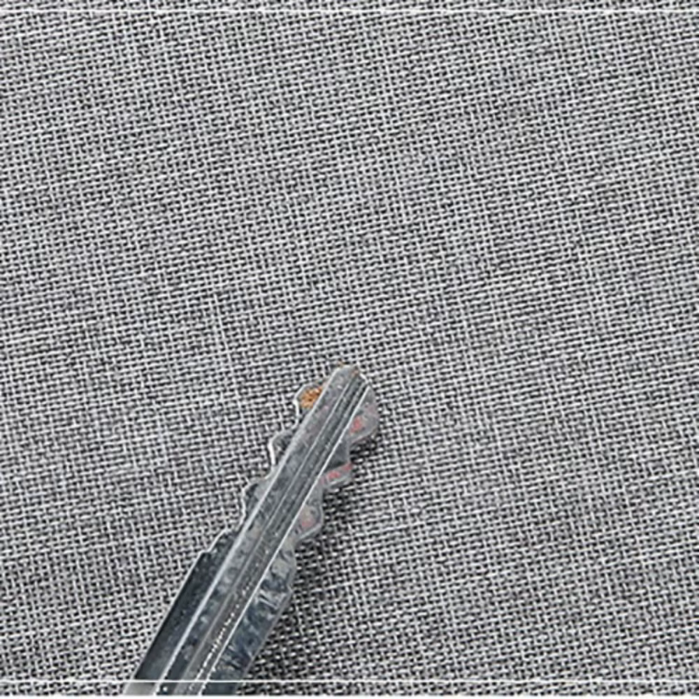 Vista lateral de la mochila Oxford mostrando bolsillos exteriores