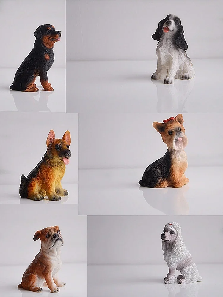 Figuras de dálmatas en miniatura en diferentes posturas