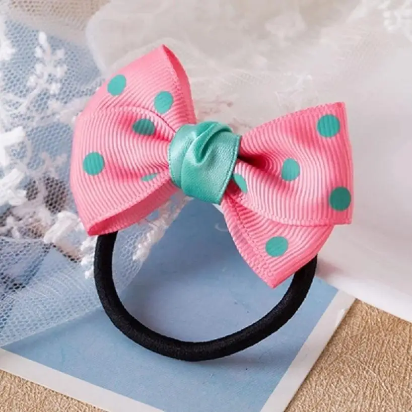 Diadema con moño en tonos pastel