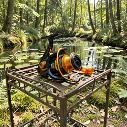 Carrete giratorio para pesca de lucio con manivela plegable