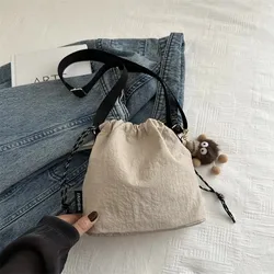 Bolso bandolera de nailon tipo cubo con cordón ajustable unisex