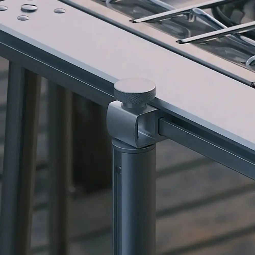 Junta de extensión universal mesa IGT aluminio con hebillas plateadas