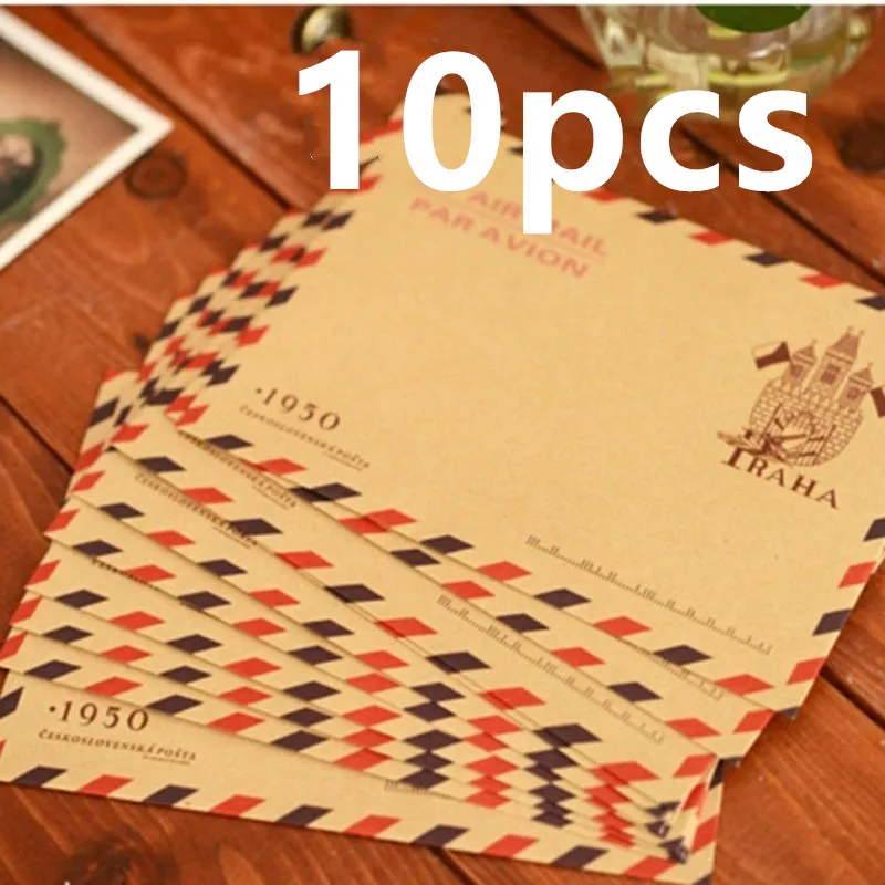 Lote de 10 sobres mini retro con estampado de correo aéreo sobre superficie de madera