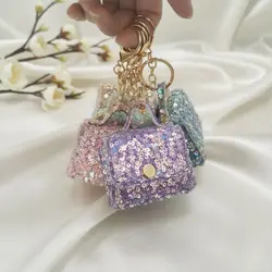 Estuche portátil con lentejuelas y llavero para auriculares DIY