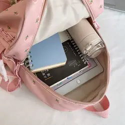 Mochila de viaje de lona con flores y correa ajustable