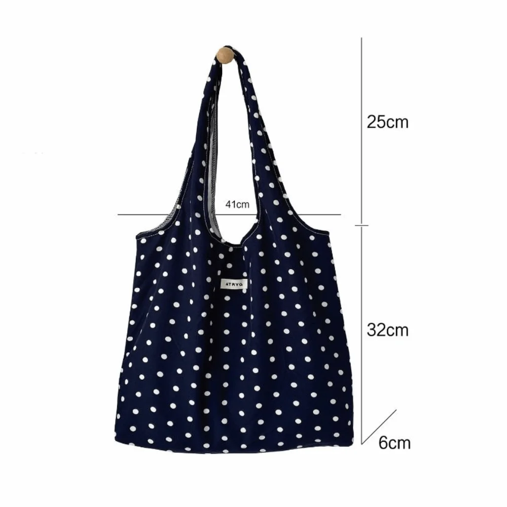 Bolso de hombro con estampado de lunares y diseño plegable