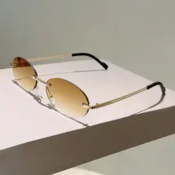 Gafas de sol ovaladas sin montura con lentes degradadas UV400