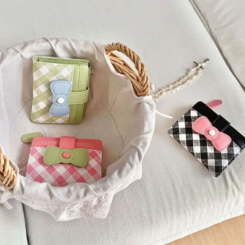 Cartera a cuadros con lazo