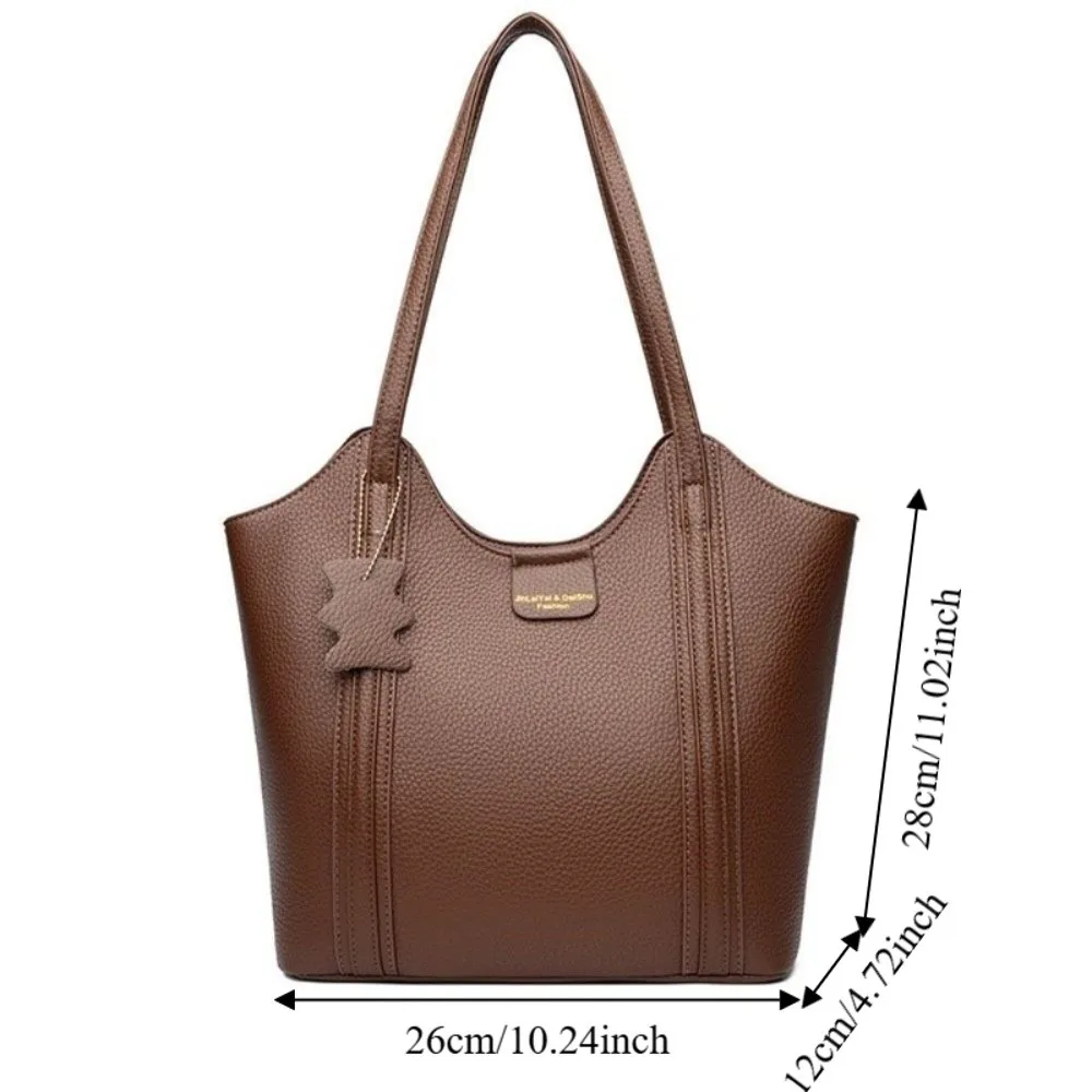 Bolso de hombro con diseño curvado y colgante