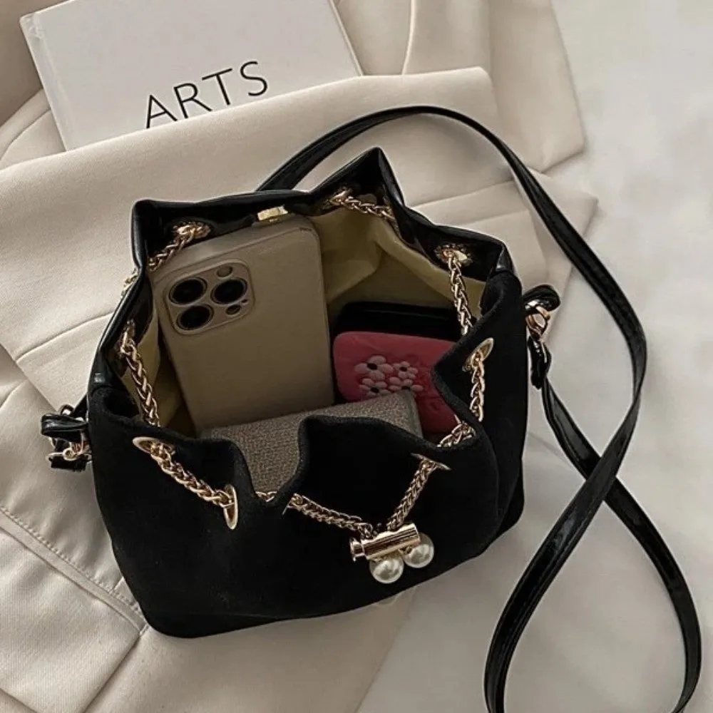 Bolso con bandolera ajustable