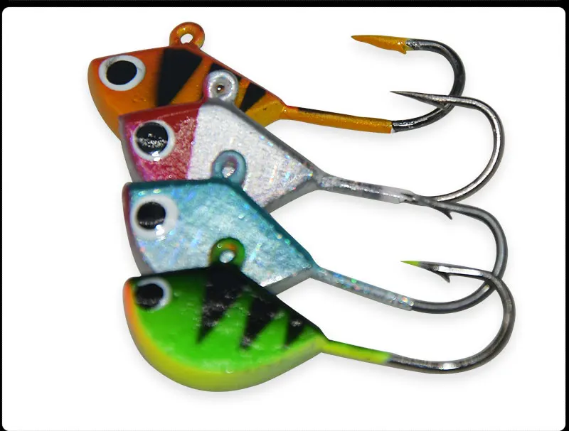 Señuelo junto a elementos de pesca invernal