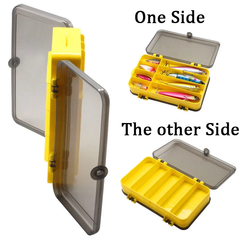 Caja de pesca en color amarillo sobre superficie de madera
