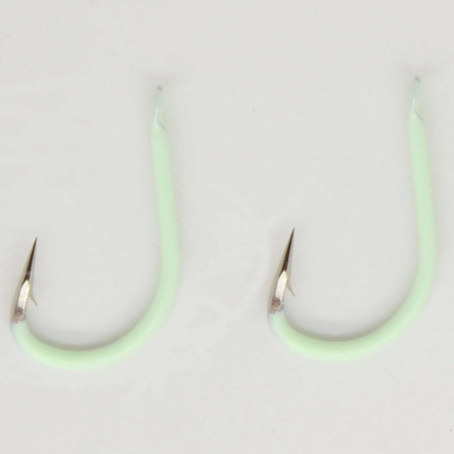 Anzóis de pesca com revestimento luminoso