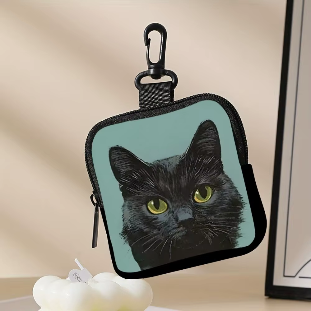 Monedero con diseño de gato abierto