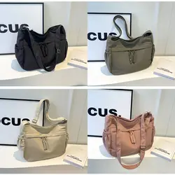 Bolso cruzado de nailon con cremallera y varios bolsillos