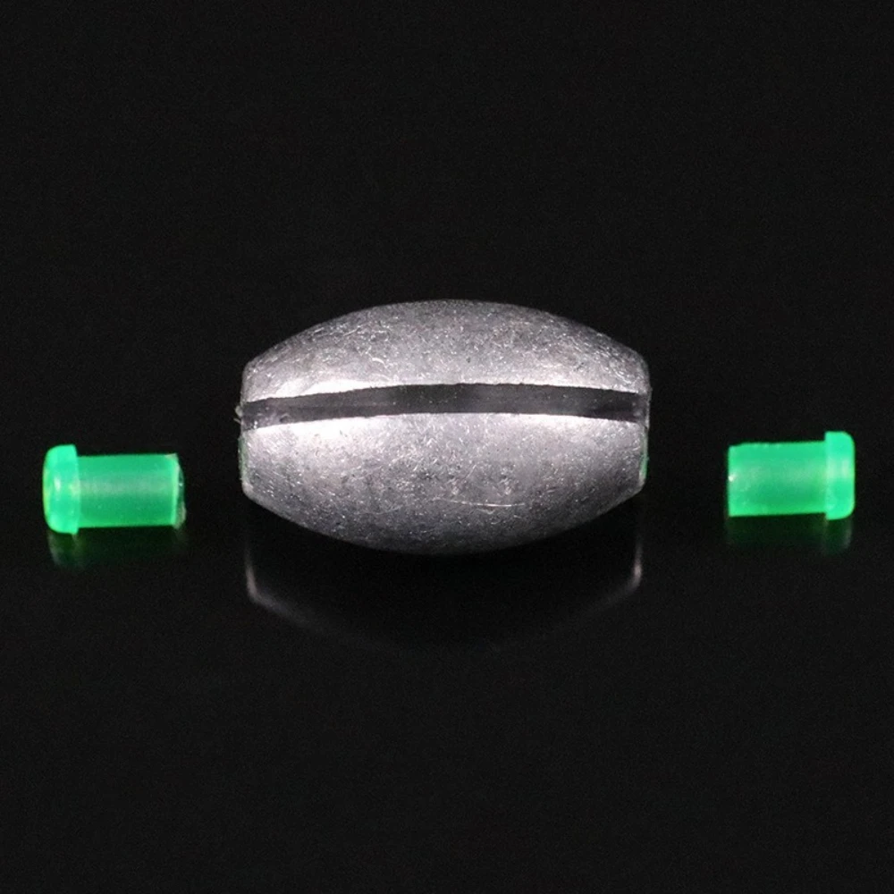 Detalle de los plomos deslizantes con conector para aparejos de pesca