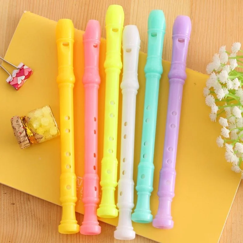 Conjunto de bolígrafos de gel con forma de clarinete color caramelo