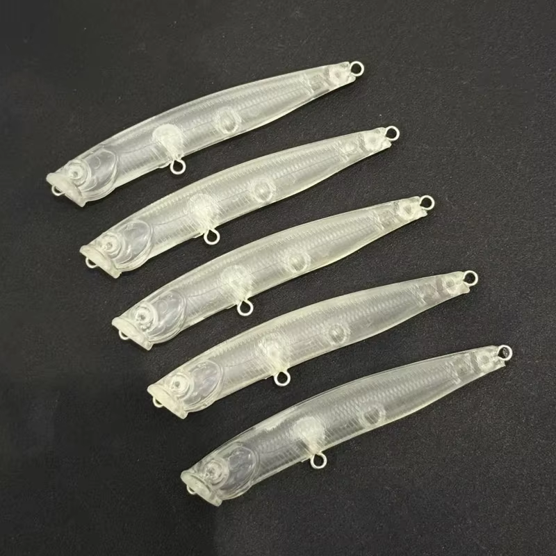 Señuelo popper de superficie con cuerpo transparente de ABS