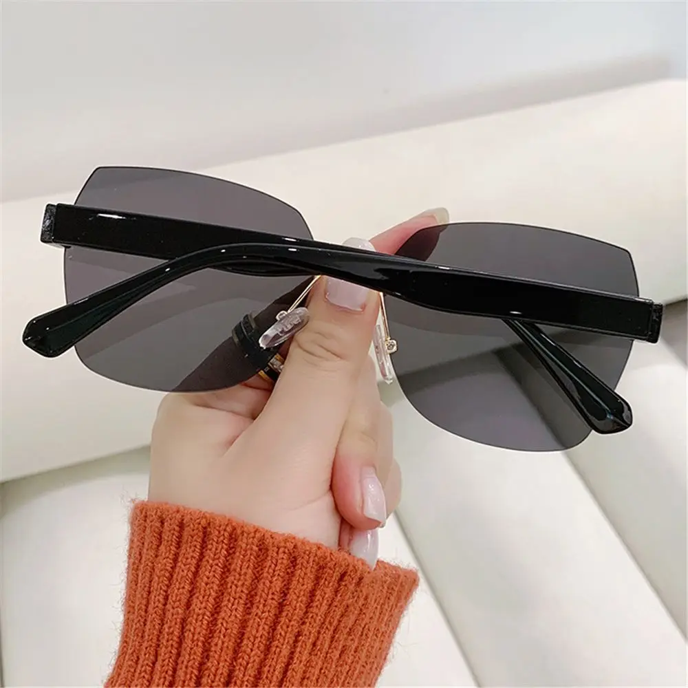 Gafas de sol vintage sin montura ahumadas para mujer