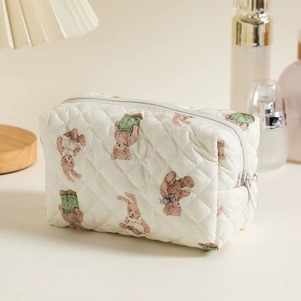 Neceser compacto de poliéster con diseño floral