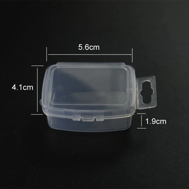 Caja transparente de plástico con compartimentos para materiales de atado de moscas