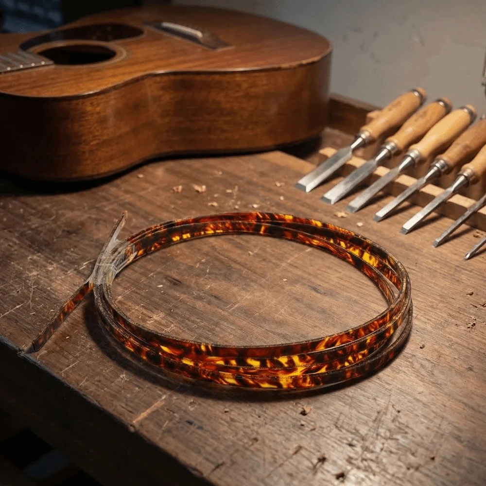 Ajuste del ribete al contorno de la guitarra