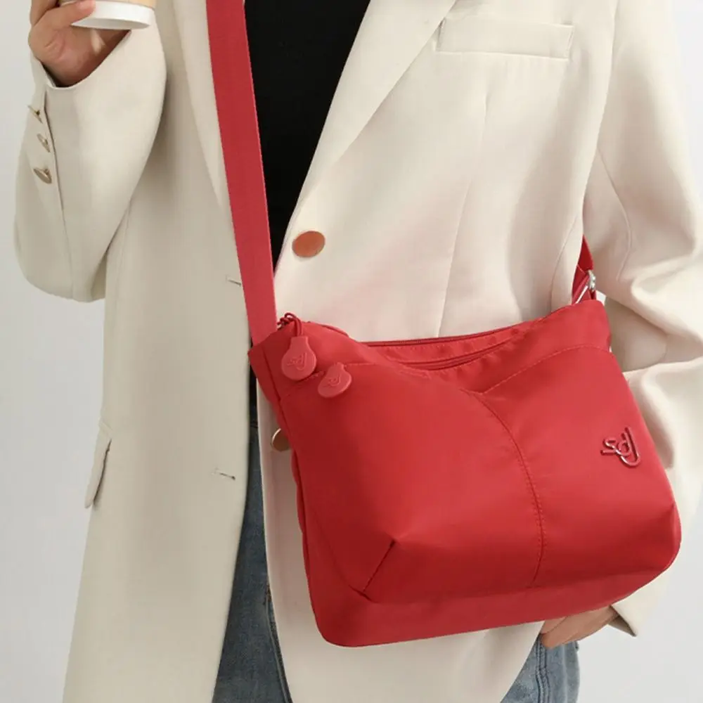 Bolso bandolera impermeable ligero de nailon con correa ajustable - imagen 2