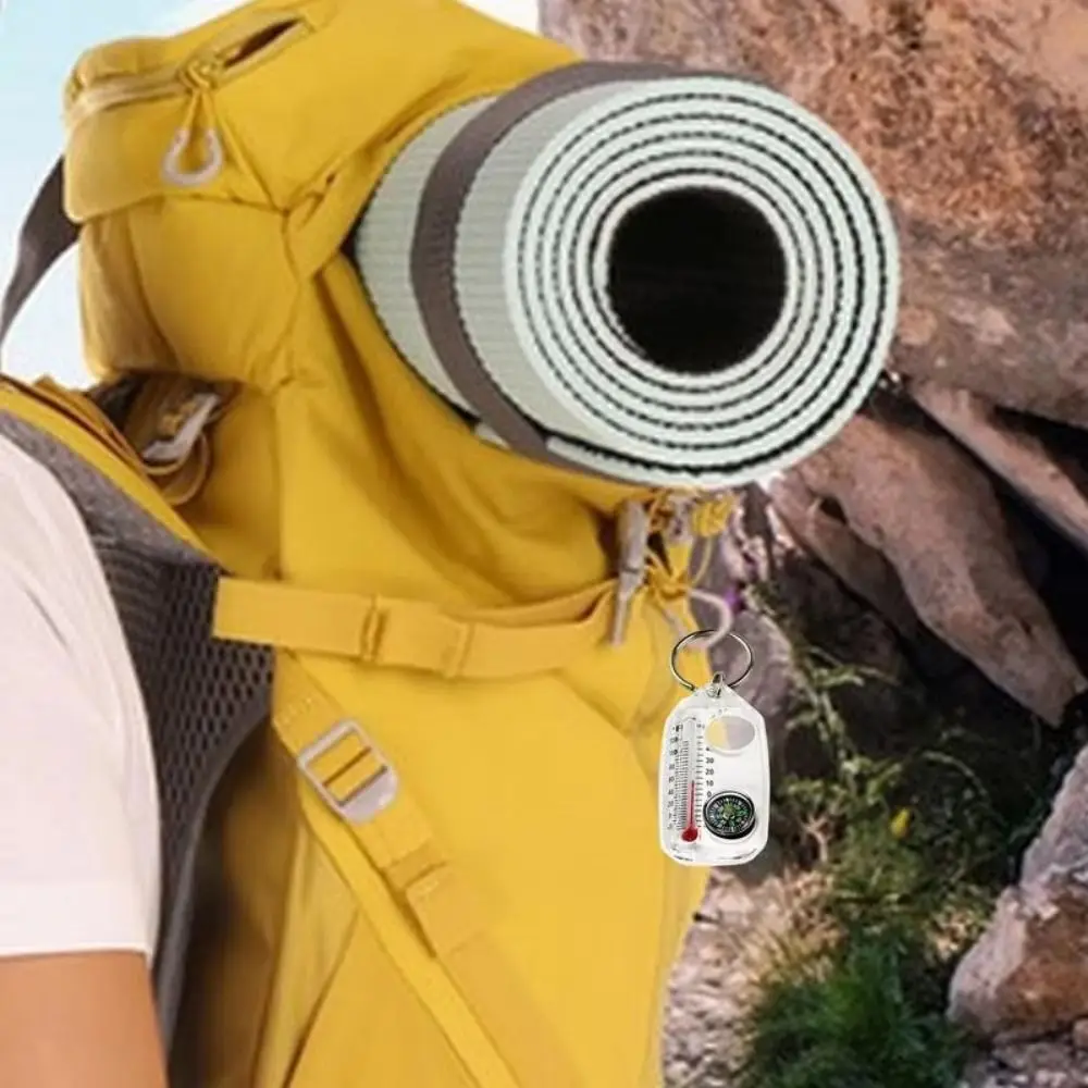 Brújula compacta de bolsillo con llavero, lupa y supervivencia