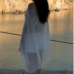 Blusa de gasa transparente holgada con cuello redondo y manga larga