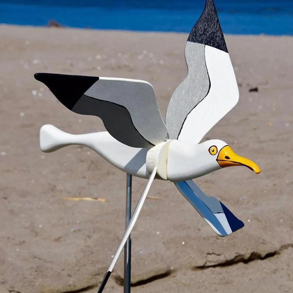 Detalle de la gaviota y las aspas del molino