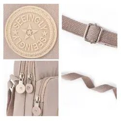 Bolso bandolera impermeable de nailon con espacio para teléfono