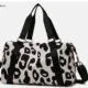 Bolsa de viaje espaciosa con estampado de leopardo, gran capacidad