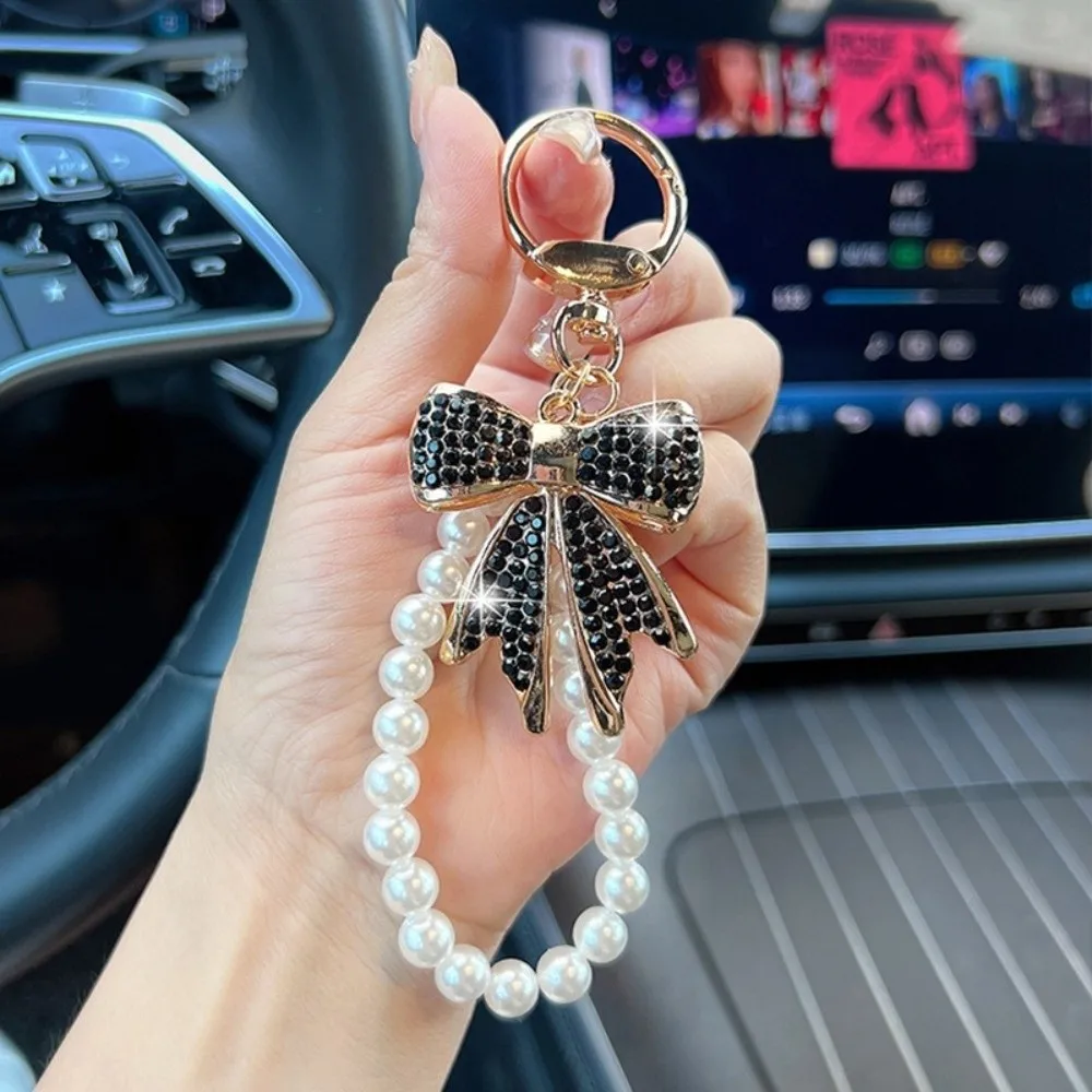 Llavero brillante con lazo de diamantes de imitación y colgante