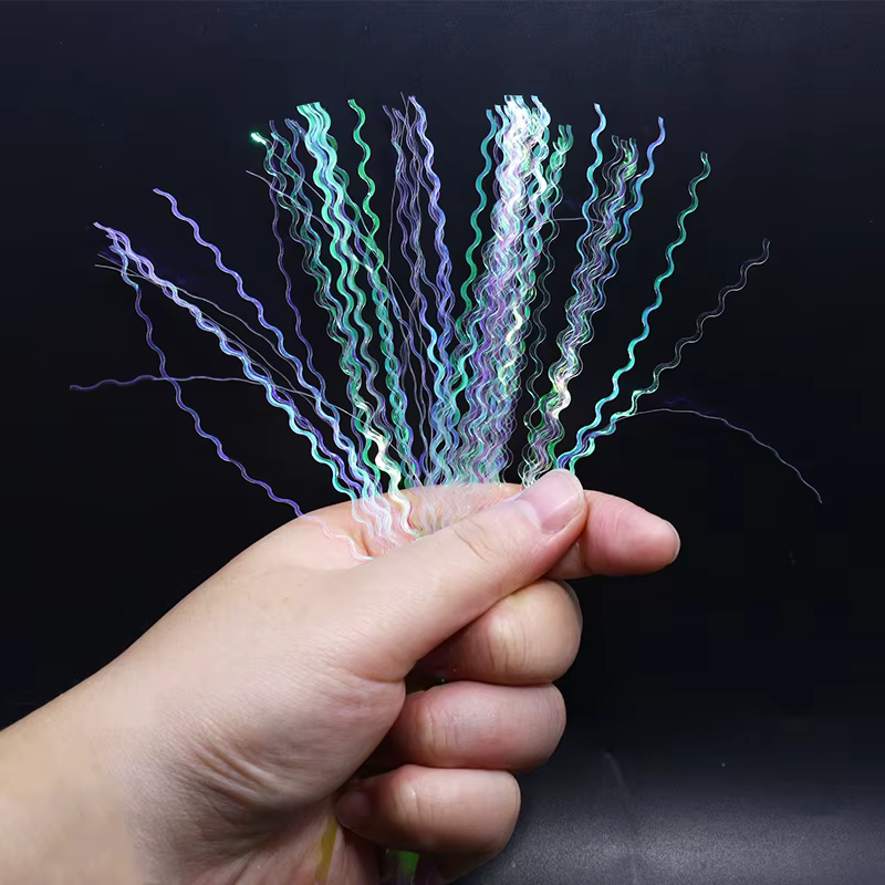 Materiales para atar moscas – Fibra ósea, flashabou y línea lateral